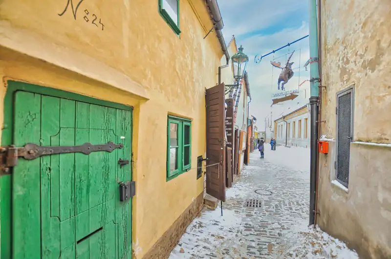 Golden Lane inside Prague Castle with its small painted cottages