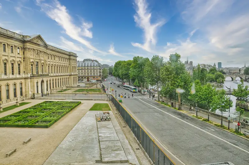 A view over the Louvre gardens and the Seine in Paris