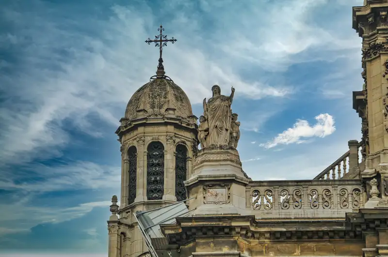 Carved detail of a church roof in Montmartre in Paris