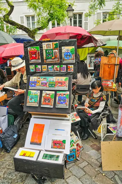Street artists and their paintings at Place du Tertre in Montmartre, Paris