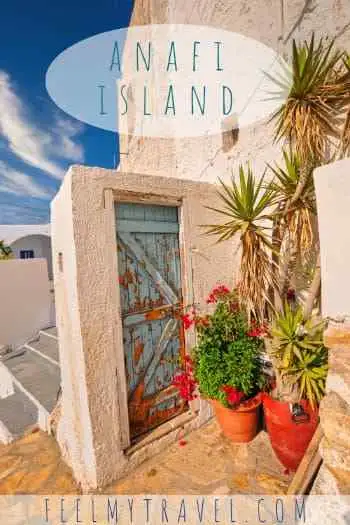 Anafi island travel guide featuring a weathered blue door and terracotta pots in a whitewashed Cycladic alley