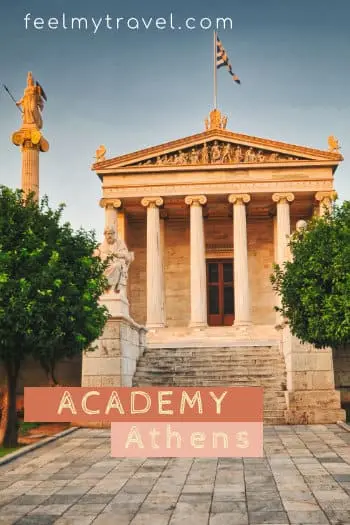The Academy of Athens seen from the garden with a statue of a seated philosopher in the foreground
