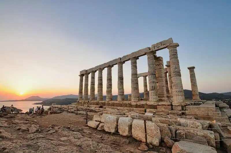 Temple of Poseidon Sounion sunset view columns ancient Greek temple Cape Sounion Greece