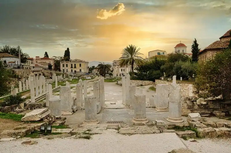Roman Agora Athens central walkway columns sunset ancient ruins Greece