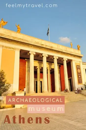 The neoclassical entrance of the National Archaeological Museum of Athens on a sunny day