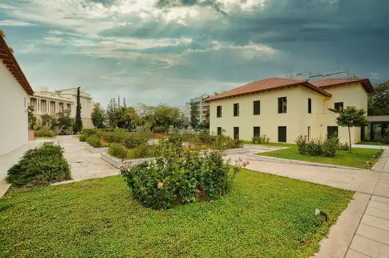 Byzantine and Christian Museum garden courtyard with historic villa buildings in Athens