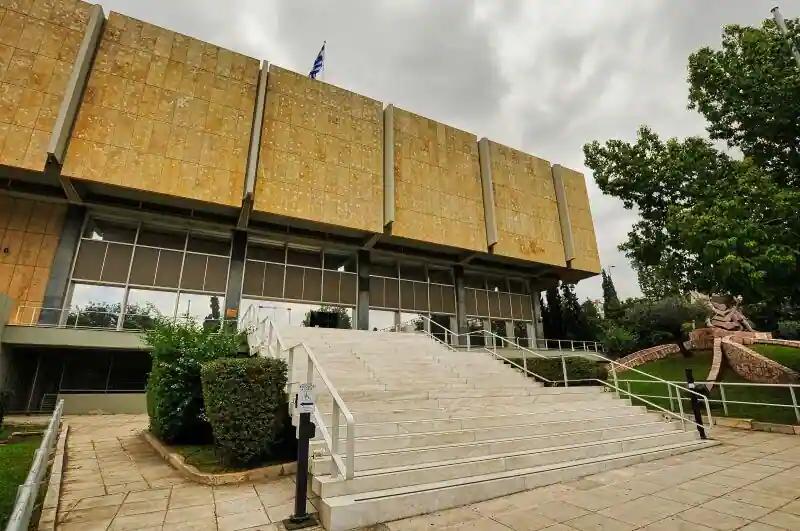 War Museum of Athens exterior with bronze cavalry sculpture and modernist stone facade