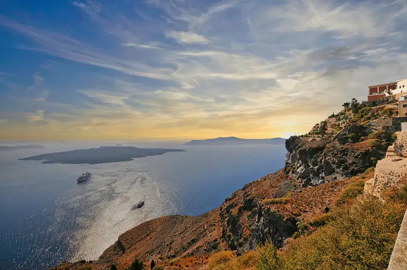 Sunset over the caldera of Santorini, a neighbouring island to Ios in the Cyclades