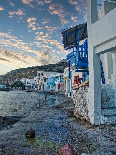The colorful syrmata fishermen houses of Klima village by the sea on Milos island