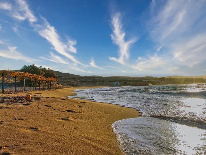The sandy shore of Mytakas beach on the north coast of Milos island