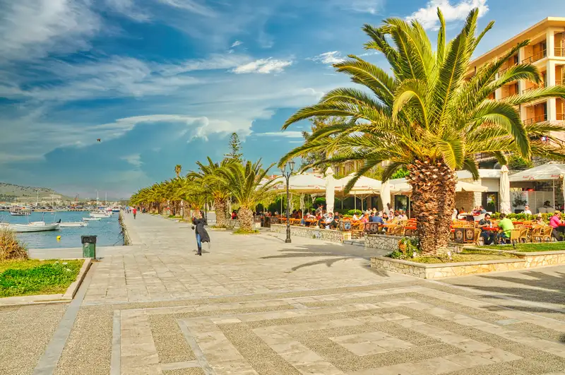 Promenade of Nafplio with cafes and boats