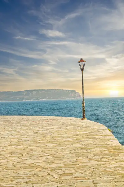 View of the sea and distant cliffs from the edge of the old town of Nafplio