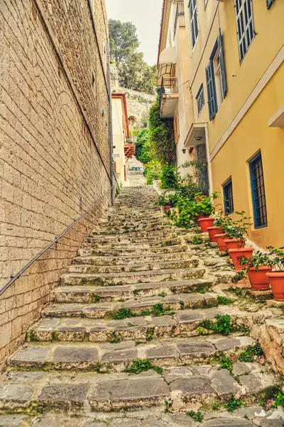 Old steps climbing between traditional houses in Nafplio old town