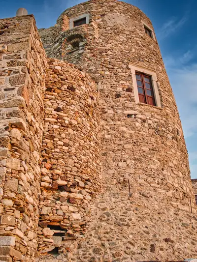 Stone walls and tower of the Venetian Kastro in Naxos Town