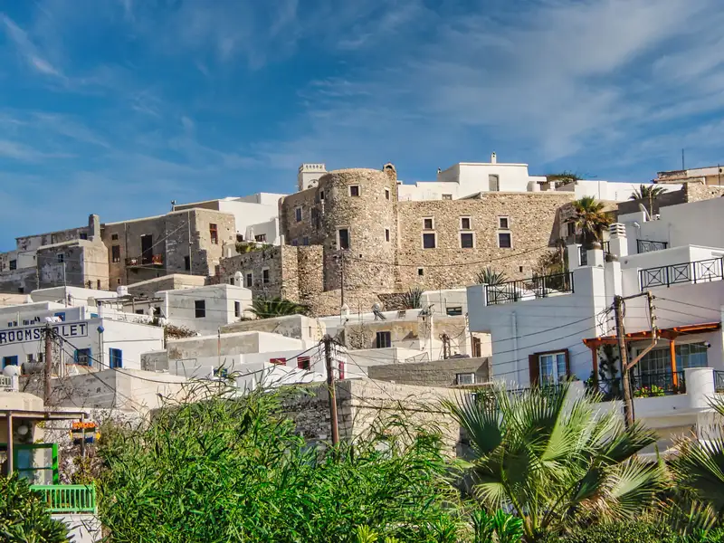 View of the Venetian Kastro above the white houses of Chora Naxos