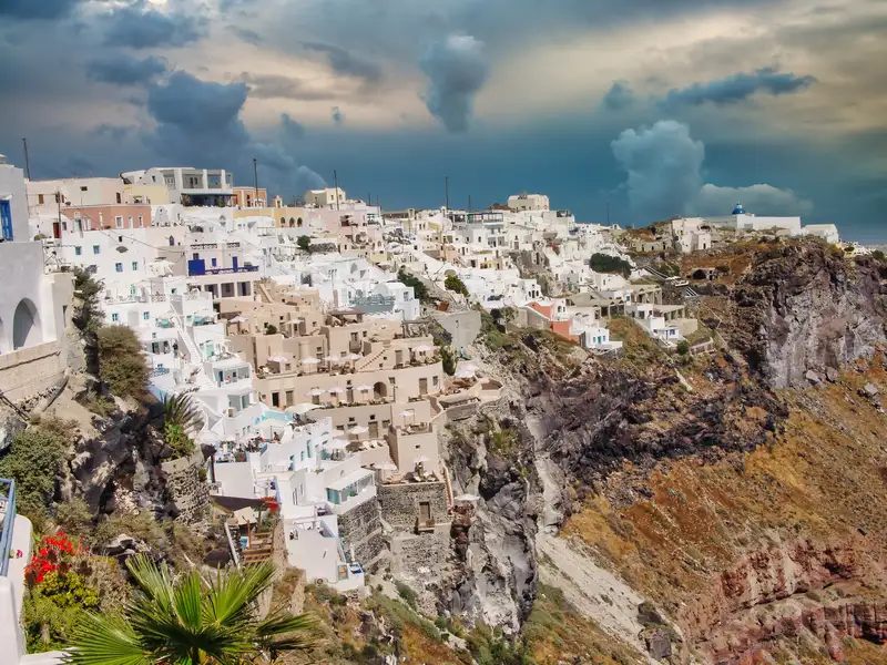 Imerovigli village on the caldera cliffs of Santorini with whitewashed and stone houses