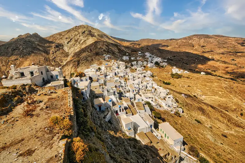 White houses on a brown hill, the whole story of Serifos in one frame