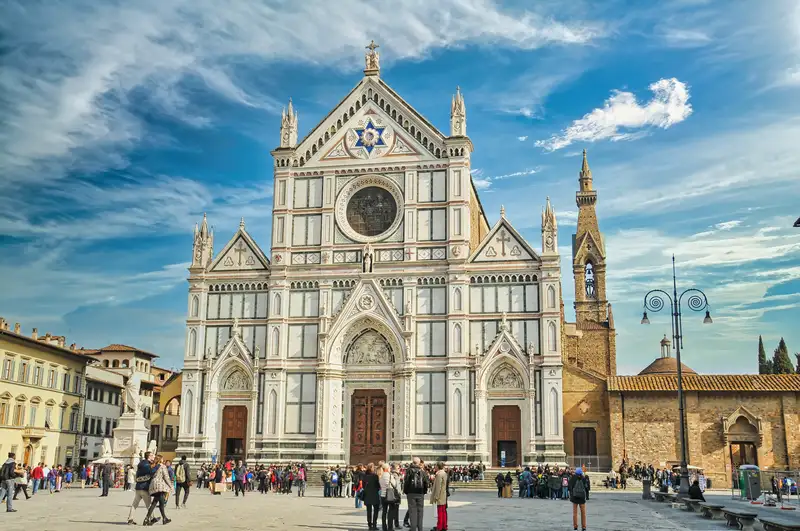 Marble facade of the Basilica di Santa Croce and its bell tower in Florence