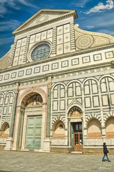 Green and white marble facade of the Basilica of Santa Maria Novella in Florence
