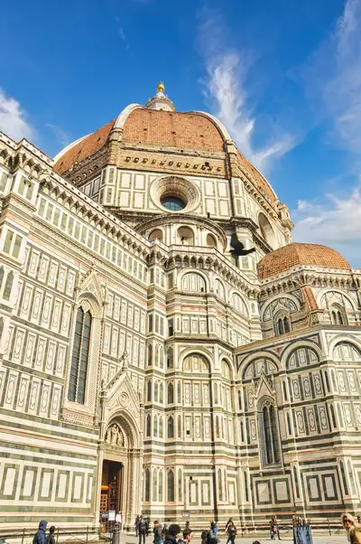 The great terracotta dome of Florence Cathedral rising above the marble walls of the Duomo