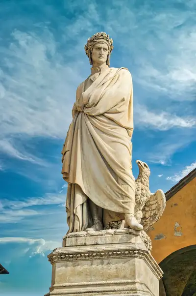 Marble statue of Dante Alighieri with an eagle at his feet beside Santa Croce in Florence
