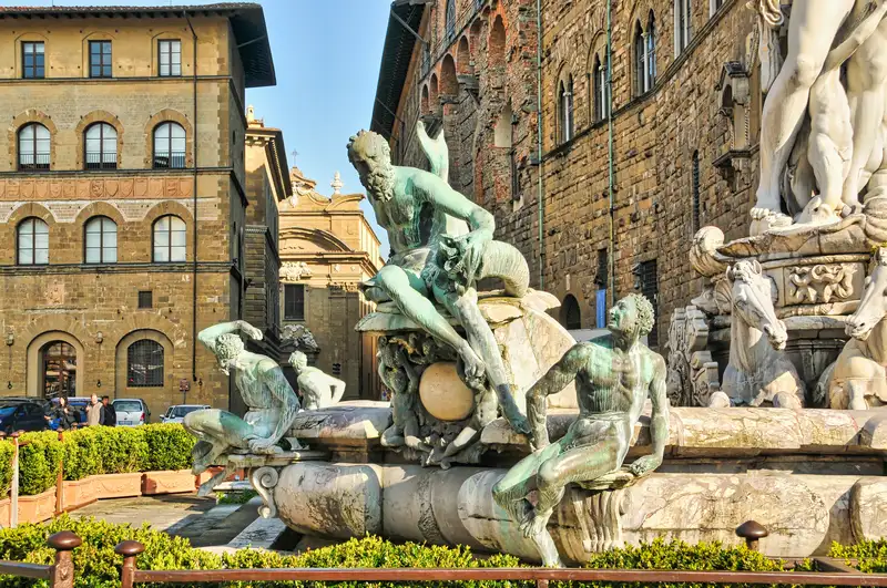Bronze nymphs and satyrs at the base of the Neptune Fountain in Piazza della Signoria, Florence