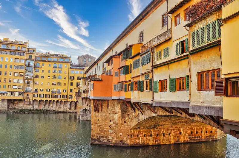 Green shutters and old stone, the crowded charm of the bridge seen up close