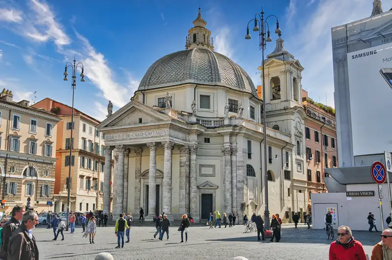 Baroque church with a rounded dome overlooking a Roman square