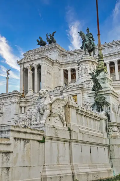 A winged lion and bronze horsemen on the Altare della Patria monument