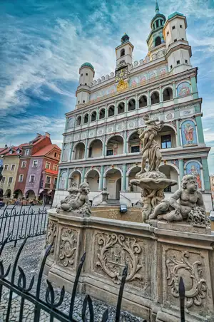 The colorful Renaissance Old Town Hall and a baroque fountain in the market square of Poznan, Poland