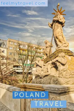 Baroque stone monument with religious figures in a town square in Poland