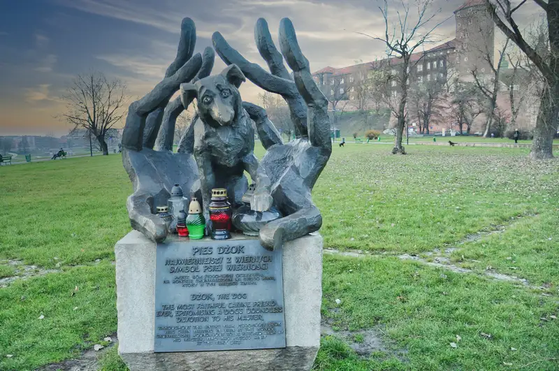 Dzok the Dog monument on the Vistula boulevard below Wawel hill in Krakow