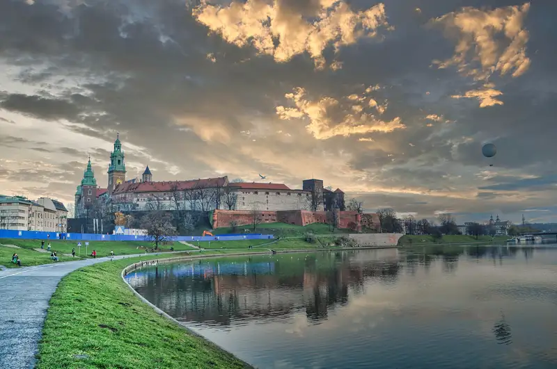 Wawel Castle reflected in the Vistula river from the Krakow boulevard
