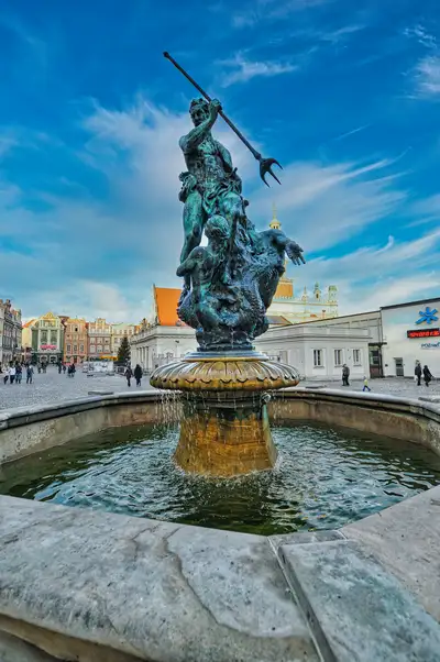 Neptune Fountain on the Old Market Square in Poznan with the Town Hall behind