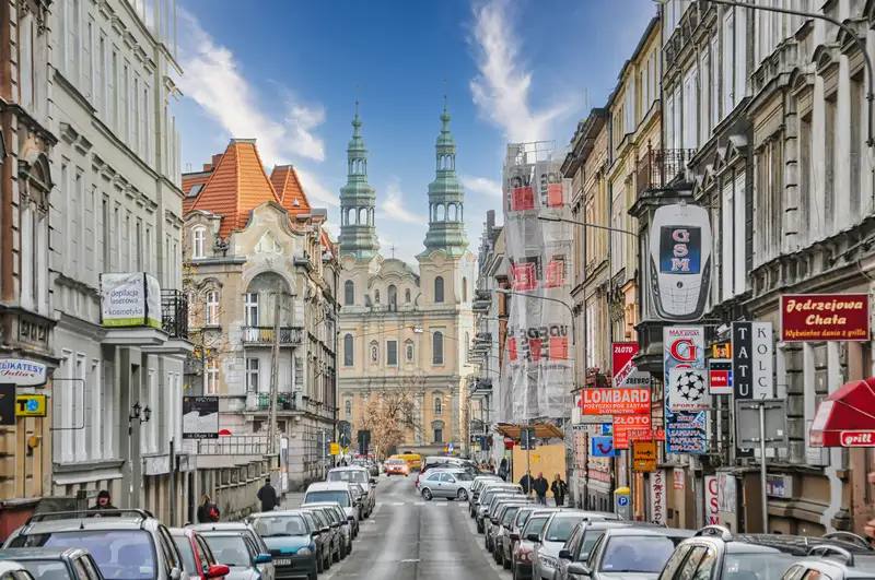 Poznan street scene with the Bernardine Church framed at the end of the road