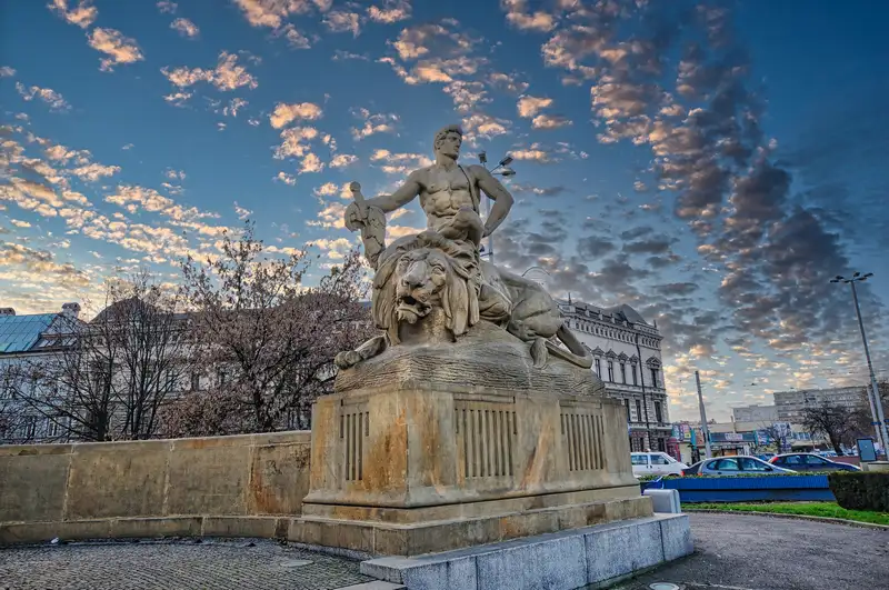 Fight and Victory sculpture of a man and lion in Wroclaw